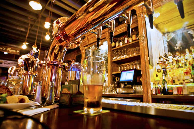 At the bar of a London pub